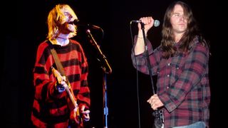 Two separate images of Kurt Cobain and Mark Lanegan performing onstage