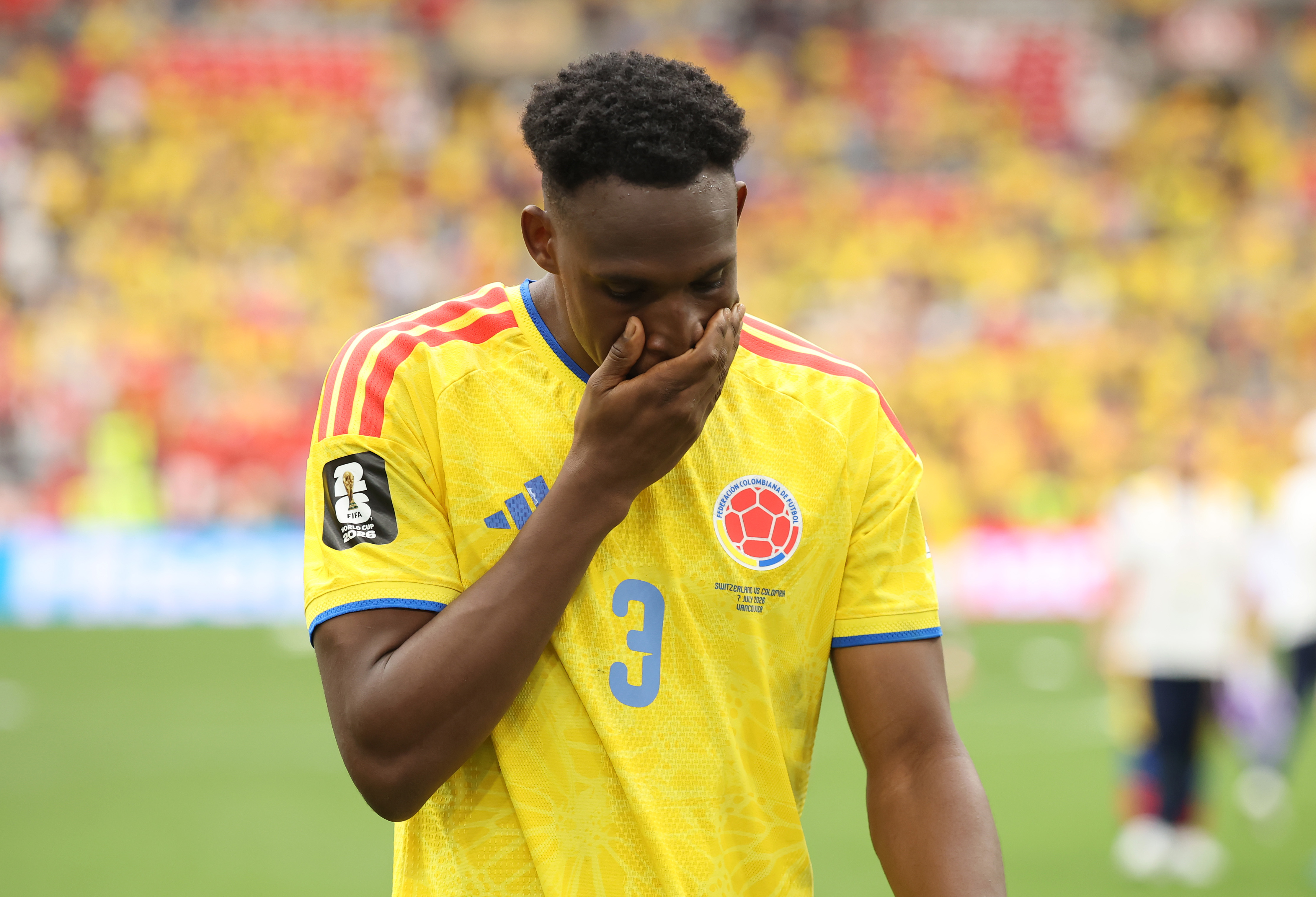Jhon Lucumi of Colombia reacts after the penalty shootout defeat against Switzerland