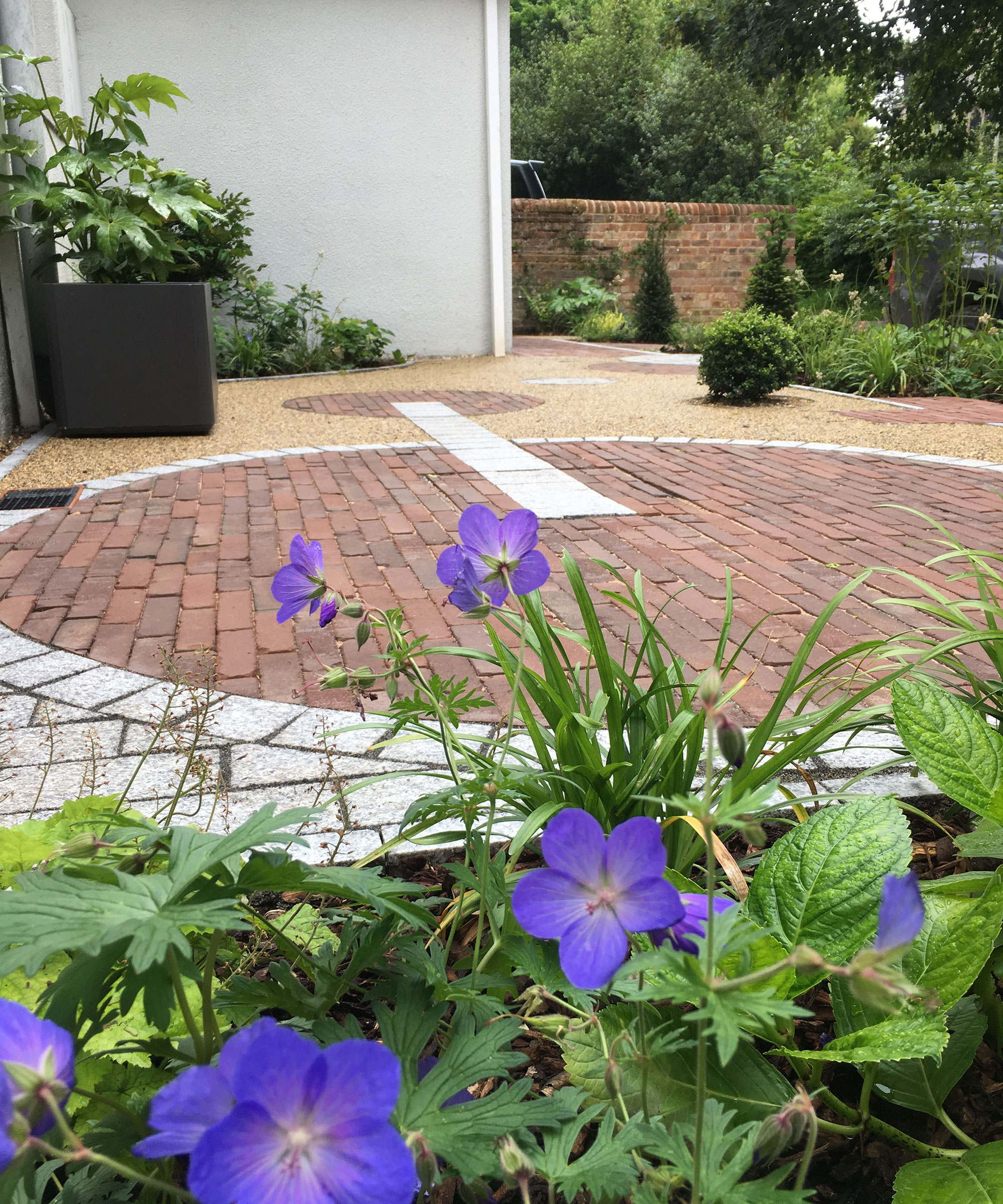two interlocking circular paved patios