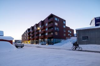 large building in greenland, showing composition of angular structures in snow