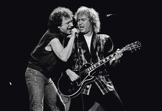 Lou Gramm and Mick Jones onstage