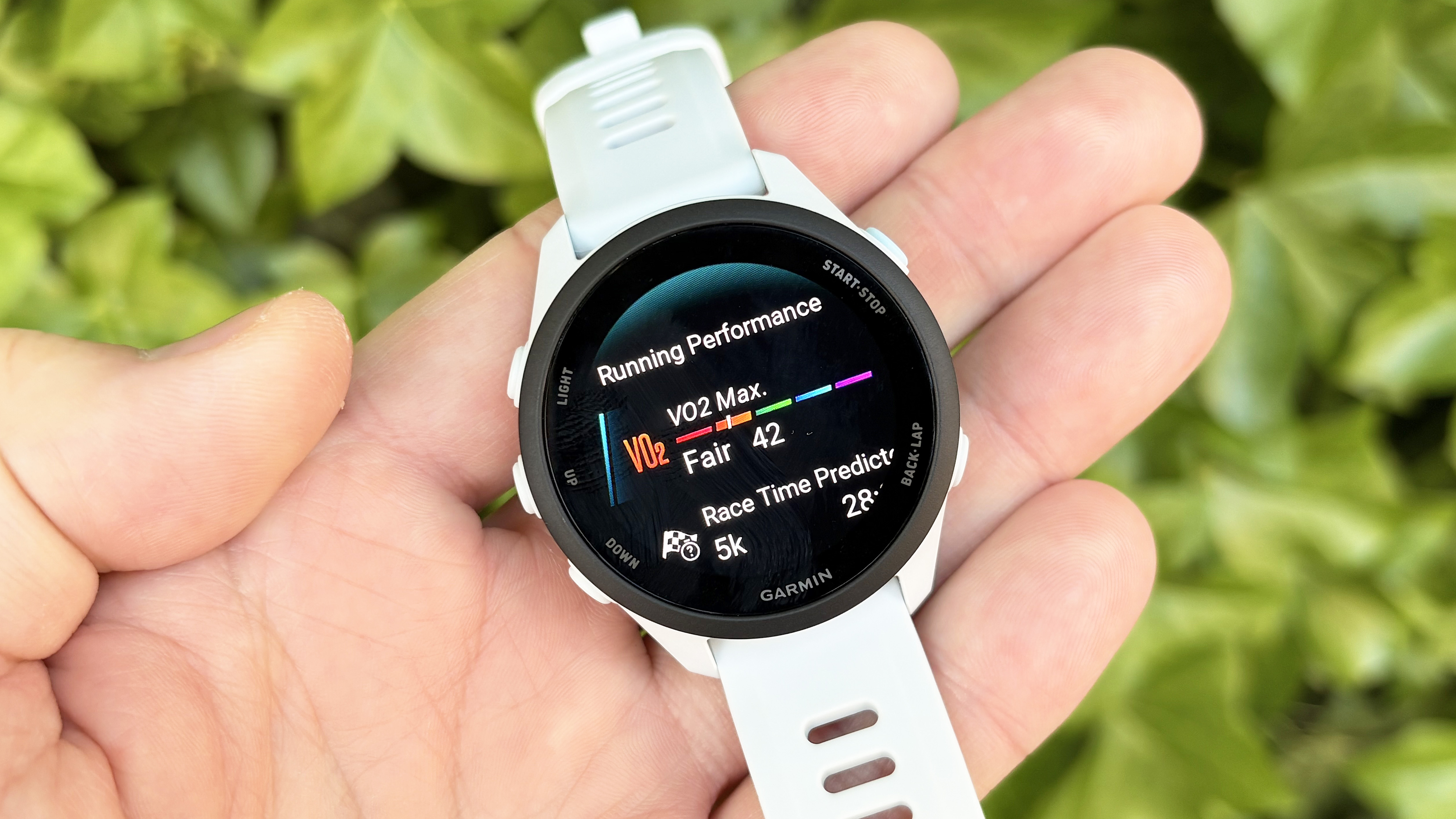 Close-up of the Garmin Forerunner 70 entry-level running watch in white