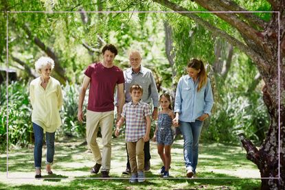 Multigenerational family walking in the woods