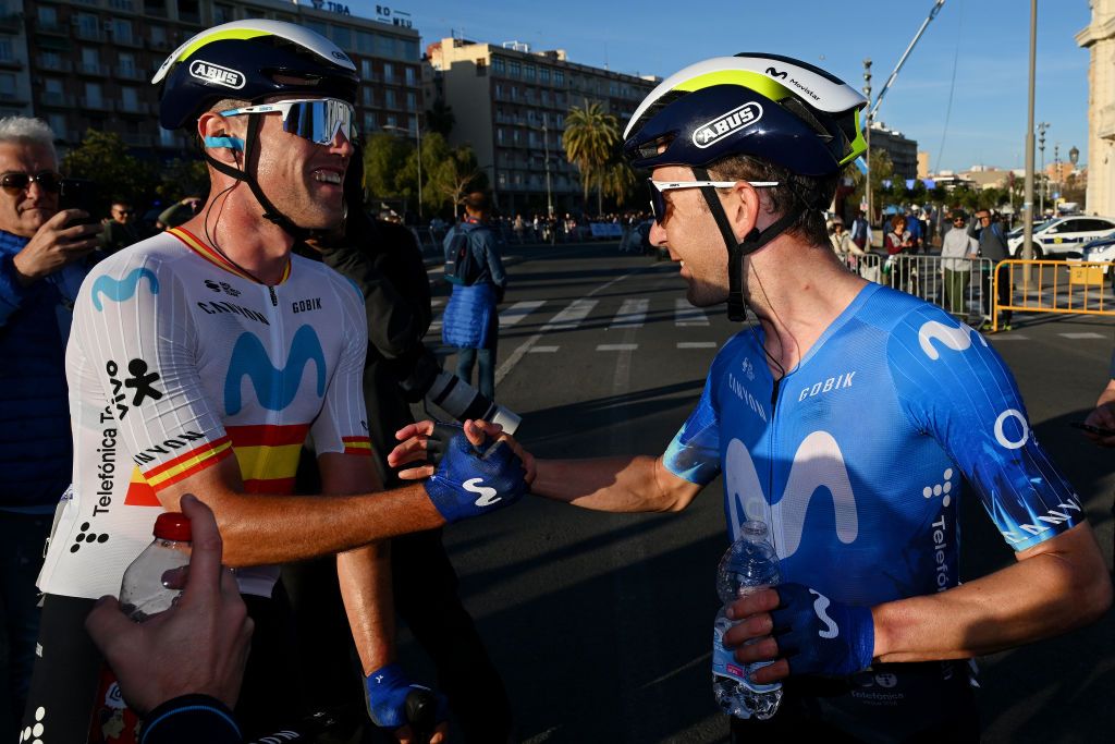 Will Barta celebrates Movistar teammate Oier Lazkano after his stage win at the Volta a la Valenciana