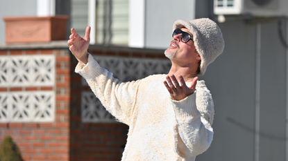 Brad Pitt Wears Shearling Bucket Hat on Set of 'Wolves