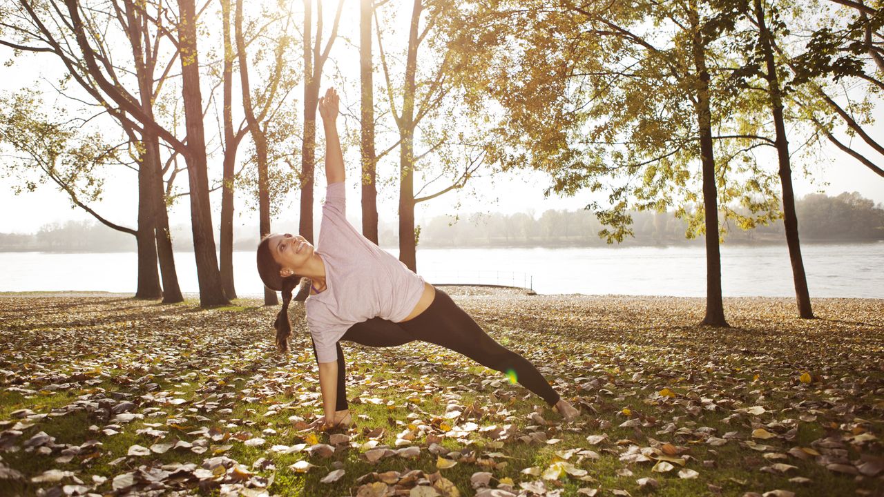 Woman practicing a lunge outdoors