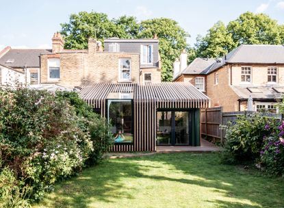Permitted development rights for extensions: contemporary extension on house by variant office