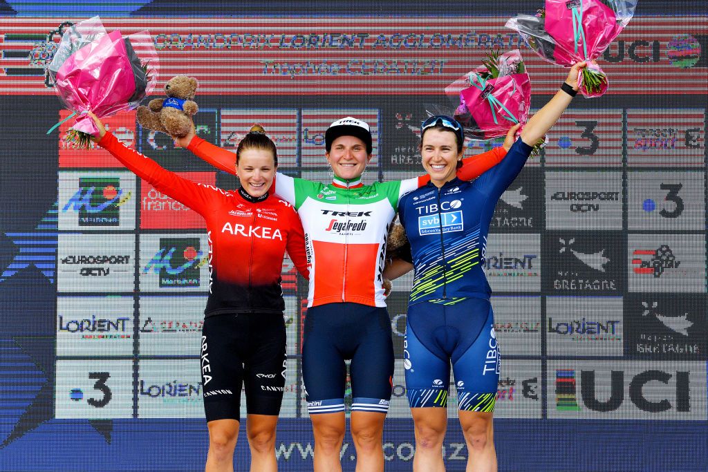 PLOUAY FRANCE AUGUST 30 LR Gladys Verhulst of France and Arkea Pro Cycling Team Elisa Longo Borghini of Italy and Team Trek Segafredo and Kristen Faulkner of United States and Team TIBCO Silicon Valley Bank celebrate winning on the podium ceremony after the 20th GP de Plouay Lorient Agglomration Trophe Ceratizit 2021 a 1504km one day race from Plouay to Plouay GrandPrixPlouay OuestFrance on August 30 2021 in Plouay France Photo by Luc ClaessenGetty Images