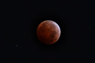 Thomas Warloe snapped this image from California during the total lunar eclipse of Oct. 8, 2014.