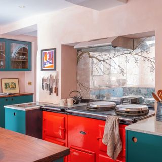 dark green kitchen and red range cooker