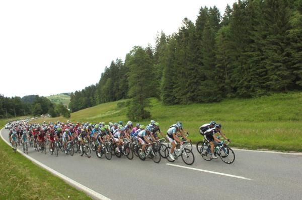 Team Sky and Omega Pharma-Lotto lead the peloton at the Tour de Suisse