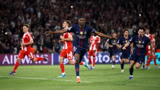 Ousmane Dembele of Paris Saint-Germain celebrates scoring his team's third goal from the penalty spot during the UEFA Champions League 2025/26 Semi Final First Leg match
