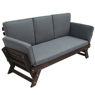 A Syngar Convertible Daybed with dark cushions