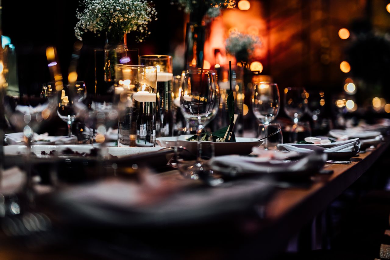 Table setting with wine glasses and candles