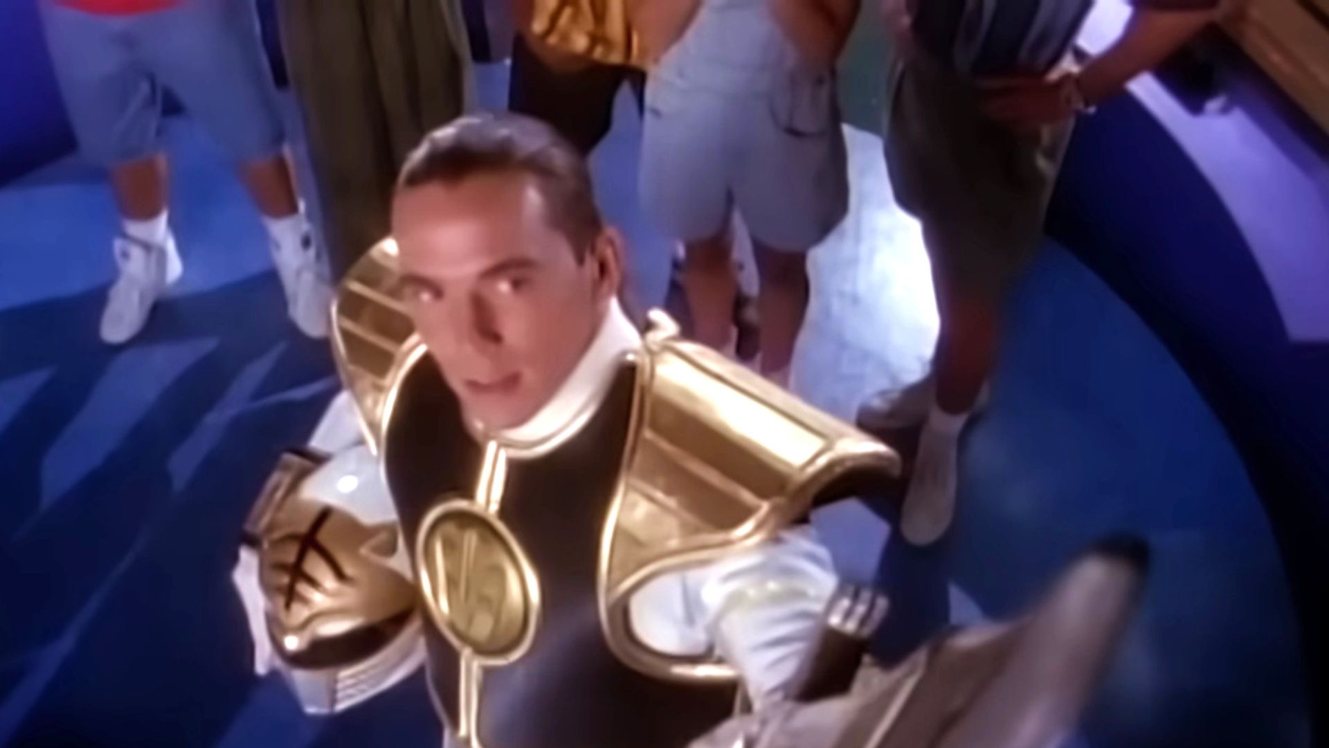 Jason David Frank staring upward as the White Ranger in Mighty Morphin Power Rangers