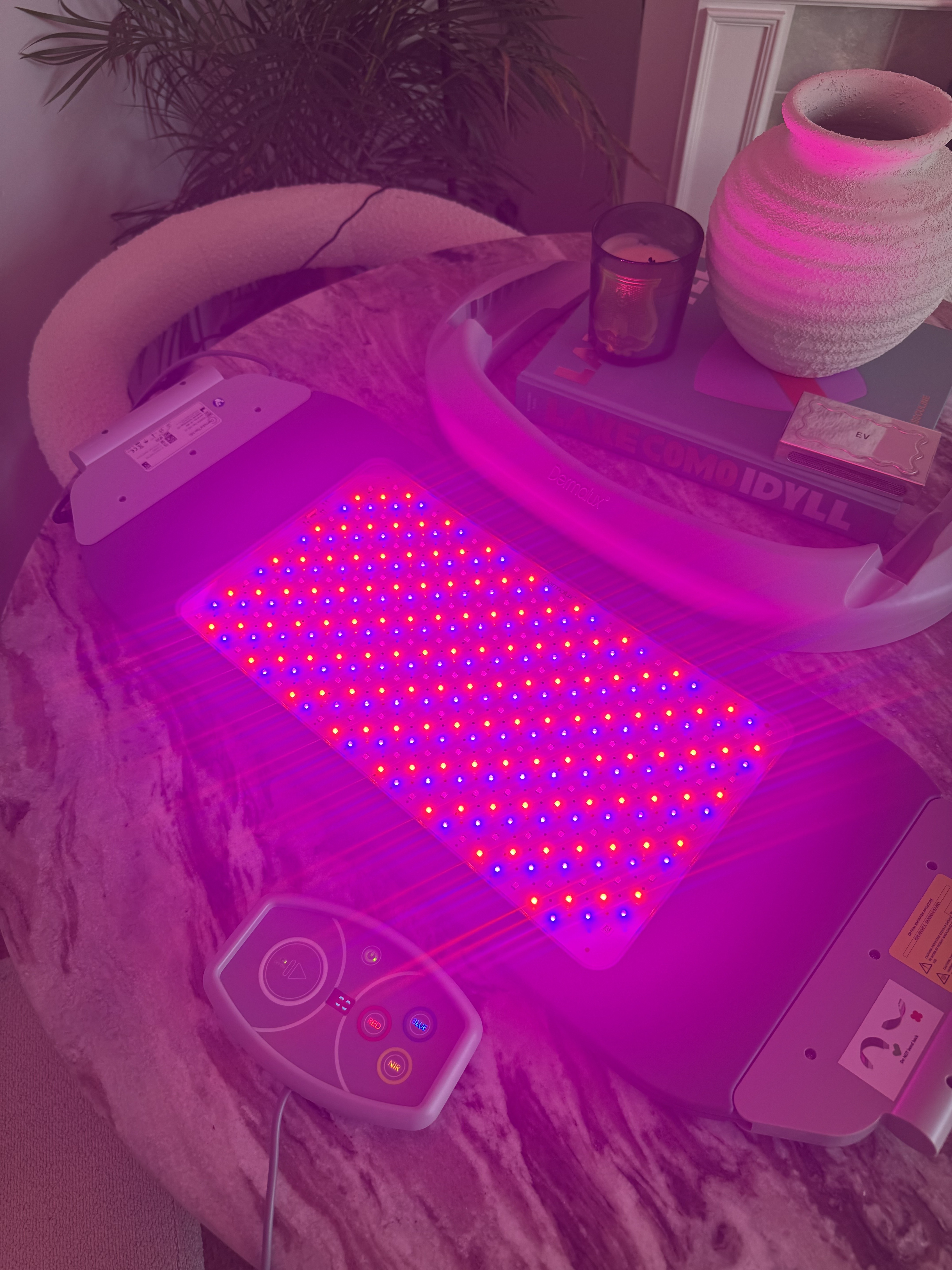The Dermalux MD LED panel switched on and removed from base
