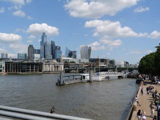 River Thames with city skyscrapers in the background