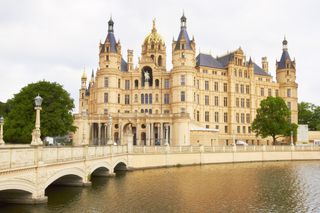 A close-up view of the Schwerin Castle and its many turrets