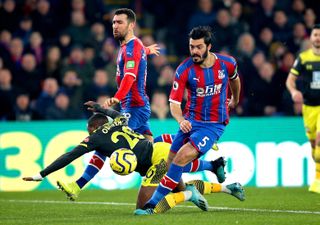 Crystal Palace defender James Tomkins, right, will be absent against Bournemouth