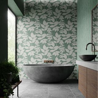 bathroom with stone effect bath, oversized floor tiles and wallpaper