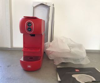Illy ESE Coffee Maker unboxed on the countertop
