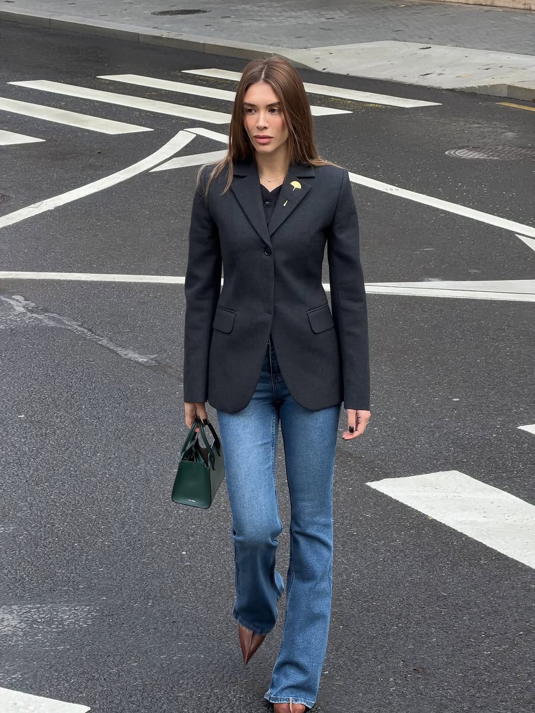 woman wearing holiday denim outfit 2025