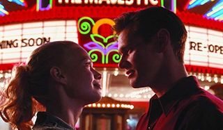 The Majestic Laurie Holden looks lovingly into Jim Carrey's eyes in front of a marquee