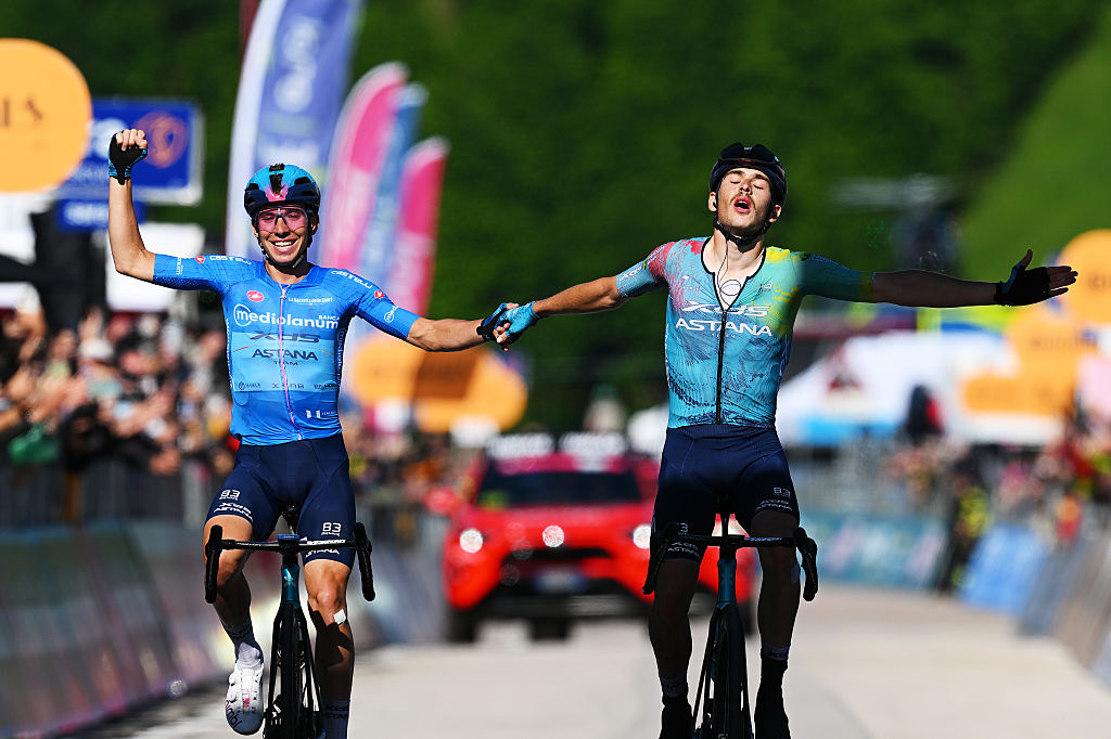 SAN VALENTINO ITALY MAY 27 LR Lorenzo Fortunato of Italy Blue Mountain Jersey as second place and the stage winner Christian Scaroni of Italy and Team XDS Astana crosses the finish line together and celebrate victory during the 108th Giro dItalia 2025 Stage 16 a 203km stage from Piazzola sul Brenta to San Valentino Brentonico 1316m UCIWT on May 27 2025 in San Valentino Italy Photo by Tim de WaeleGetty Images