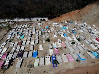 Graves in a new area of El Palmar cemetery reserved for COVID-19 victims in Acapulco, Mexico, on January 21, 2021.