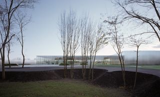 A low building in a stark landscape