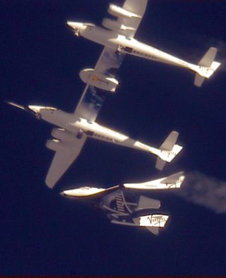 The WhiteKnightTwo Carrier Plane drops Virgin Galactic's SpaceShipTwo to begin its first solo glide test flight on Oct. 10, 2010.