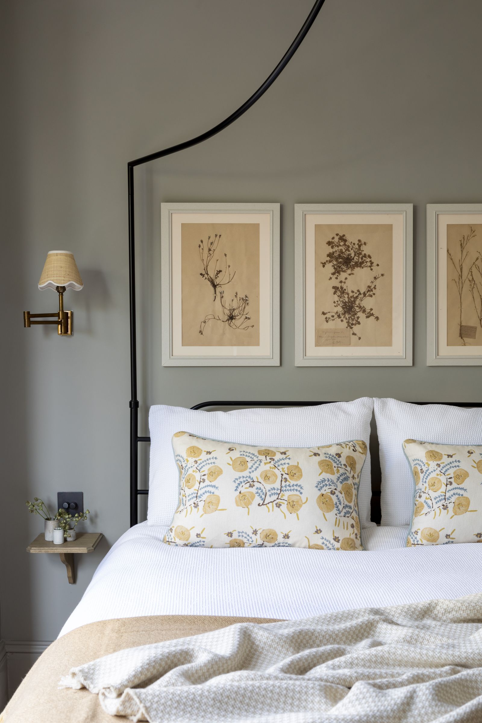 Should you hang art above your bed? 5 things to consider when