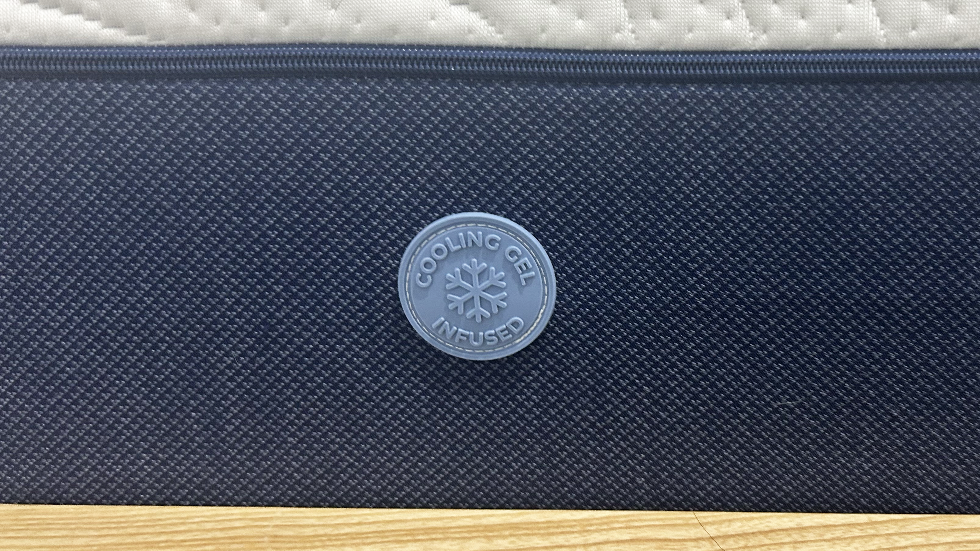 Onebed cooling gel logo on side of mattress