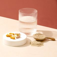 What does ashwagandha do? A supplement and a glass of water