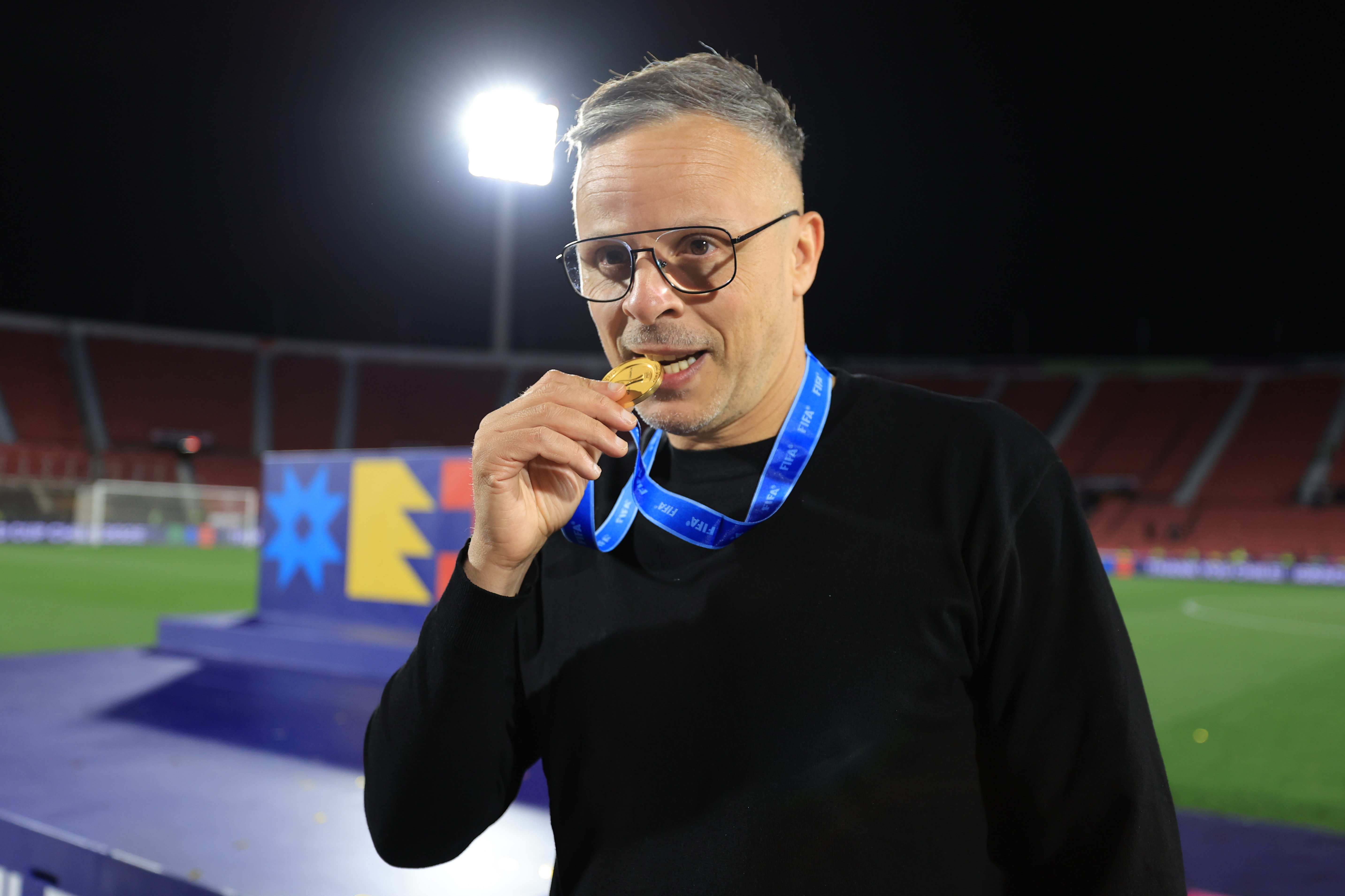 SANTIAGO, CHILE - OCTOBER 19: Mohamed Ouahbi, Head Coach of Morocco celebrates with winner&amp;amp;apos;s medal following his side&amp;amp;apos;s victory in the FIFA U-20 World Cup Chile 2025 final match between Argentina and Morocco at Estadio Nacional Julio Mart&amp;iacute;nez Pr&amp;aacute;danos on October 19, 2025 in Santiago, Chile. (Photo by Buda Mendes - FIFA/FIFA via Getty Images)