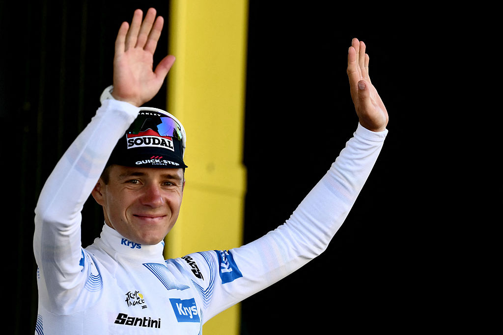 Remco Evenepoel celebrates on the podium with the best young rider&#039;s white jersey after the 5th stage of the 112th edition of the Tour de France cycling race, 33 km individual time trial starting and finishing in Caen