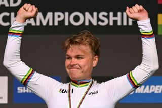 Gold medallist Norways Tobias Foss celebrates on the podium after the mens individual elite time trial cycling event at the UCI 2022 Road World Championship in Wollongong on September 18 2022 IMAGE RESTRICTED TO EDITORIAL USE STRICTLY NO COMMERCIAL USE Photo by WILLIAM WEST AFP IMAGE RESTRICTED TO EDITORIAL USE STRICTLY NO COMMERCIAL USE Photo by WILLIAM WESTAFP via Getty Images