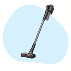 Black Miele cordless stick vacuum on a blue splodge