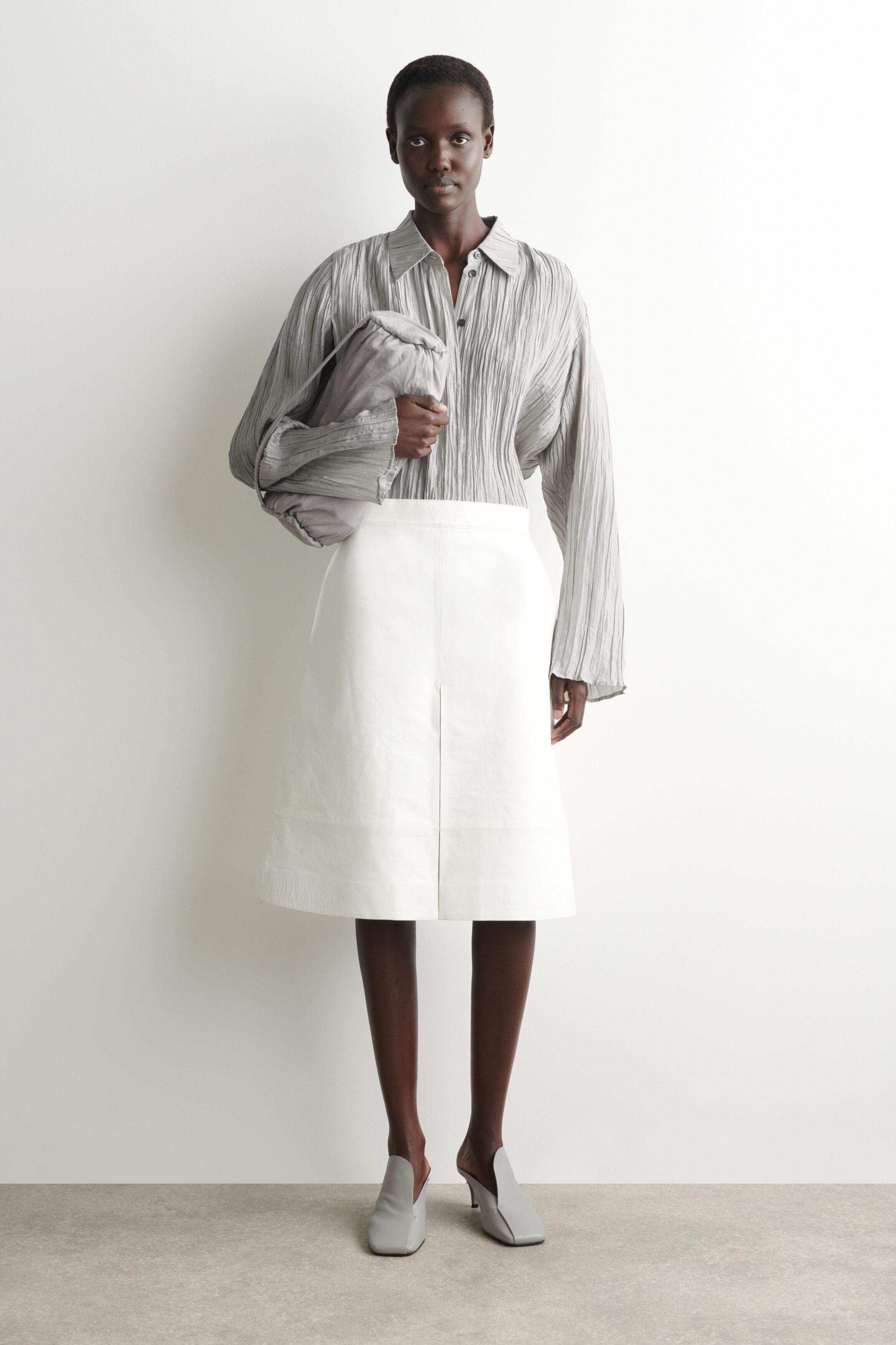 Mini Cylinder Clutch Bag - Textured-Leather