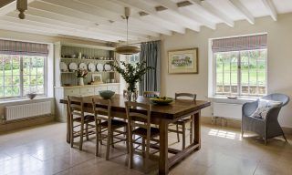 dining table with flower vase