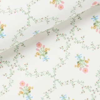 White wallpaper with pastel florals