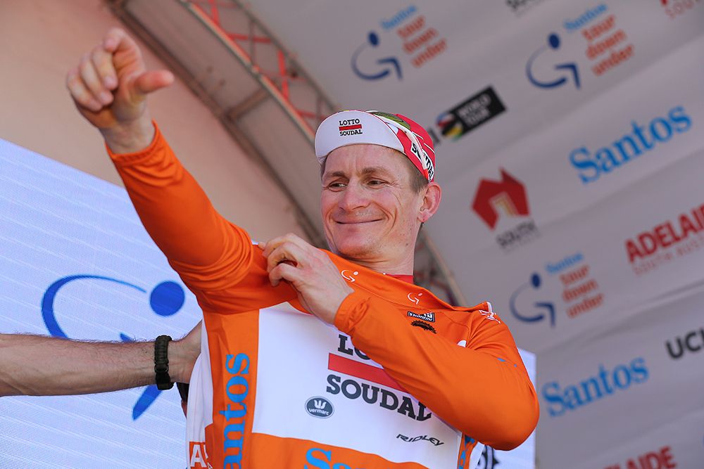 Andre Greipel pulls on the first ochre leader's jersey of the 2018 Tour Down Under