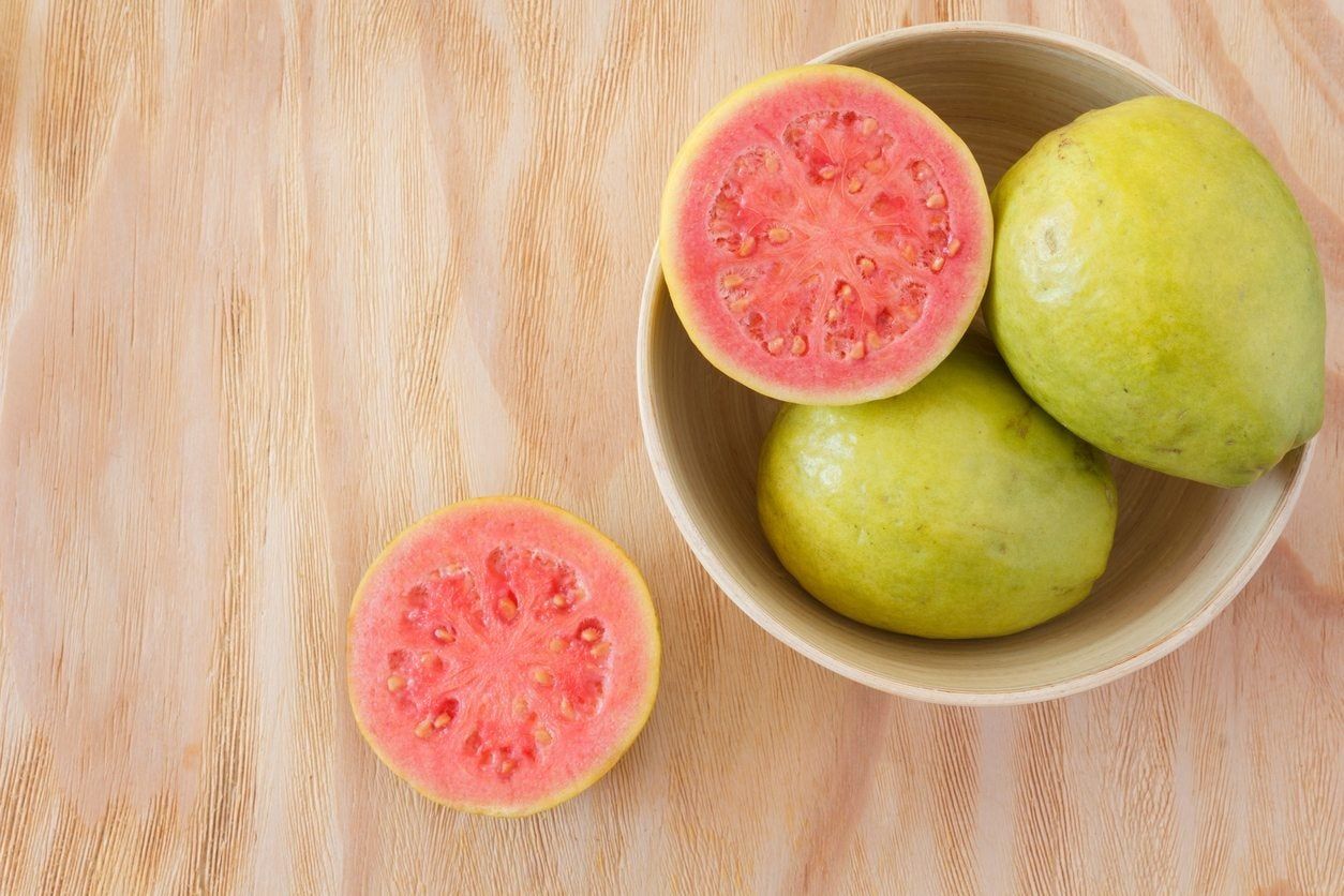 Whole And Sliced Open Guava Fruits