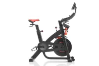 Bowflex C7 Bike is pictured in the image with the saddle on the left of the image, and handlebars and screen to the right
