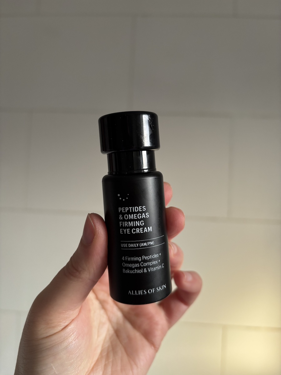 Mica Ricketts holding Allies of Skin Peptides &amp;amp; Omegas Firming Eye Cream