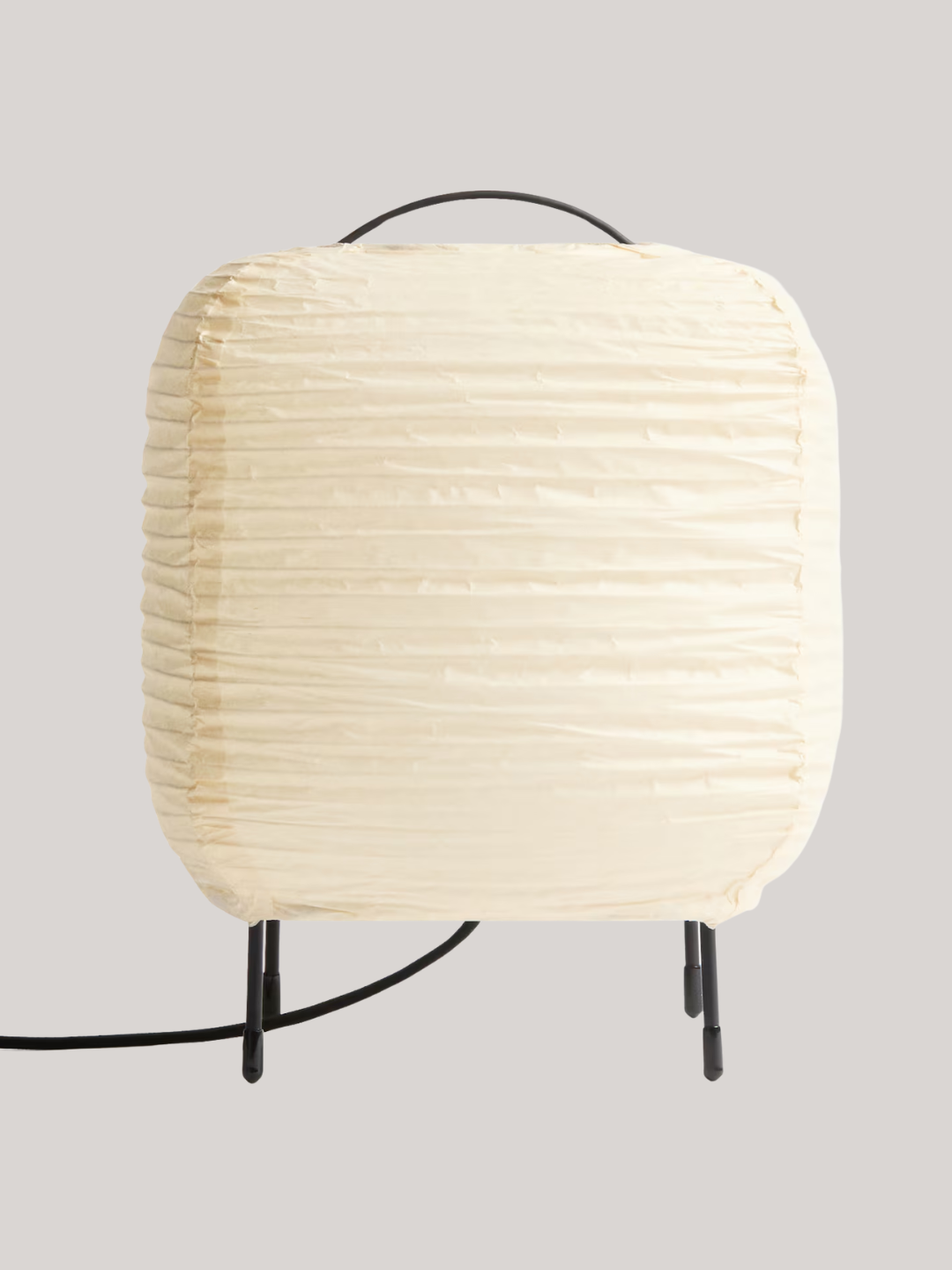 A light beige corded rice paper table lamp from H&amp;amp;M