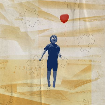 boy jumping with a ballon