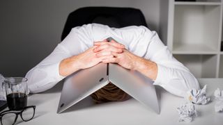 Frustrated man on laptop