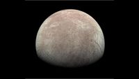 A view of a white-ish world with a subtle, large brown patch over it. There are streaks all over as well.