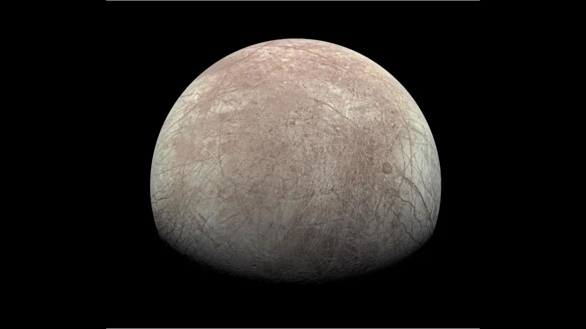 A view of a white-ish world with a subtle, large brown patch over it. There are streaks all over as well.
